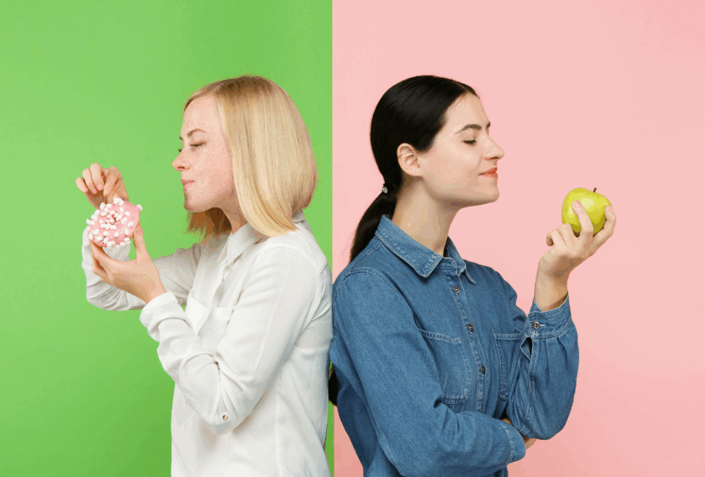 健康的な食事をする女性と不健康な食事をする女性
